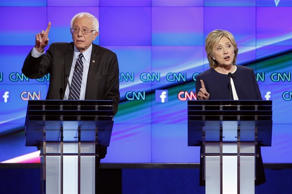 Former Secretary of State Hillary Clinton and Sen. Bernie Sanders during the Democratic presidential debate, Las Vegas, Oct. 13, 2015 (AP photo by John Locher).