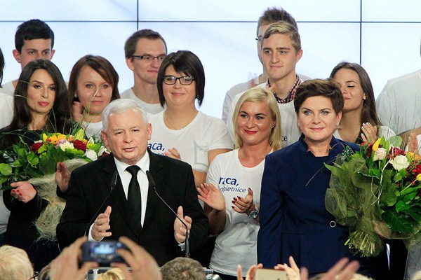 Conservative Law and Justice leader Jaroslaw Kaczynski, left, and Justice candidate for prime minister Beata Szydlo, right, at the party's headquarters in Warsaw, Poland, Oct. 25, 2015 (AP photo by Czarek Sokolowski).