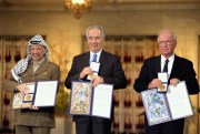 PLO Chairman Yasser Arafat, Israeli Foreign Minister Shimon Peres and Israeli Prime Minister Yitzhak Rabin at the Nobel Peace Prize award ceremony, Oslo, Norway, Dec. 10, 1994 (Israeli Government Press Office photo).