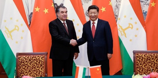 Chinese President Xi Jinping shakes hands with Tajik President Emomali Rakhmon during a signing ceremony at the Diaoyutai State Guesthouse, Beijing, Sept. 2, 2015 (AP photo by Lintao Zhang).