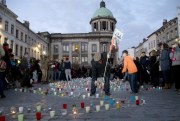 A candlelight vigil for the victims of the Paris attacks, Molenbeek, Belgium, Nov. 18, 2015 (AP photo by Virginia Mayo).