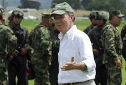 President Juan Manuel Santos at a military base where he spoke to and shook hands with soldiers who took part in the operation that led to the death of the top leader of the FARC, Popayan, Colombia, Nov. 5, 2011 (AP photo by Carlos Julio Martinez).