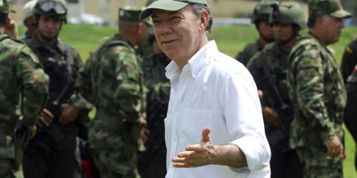 President Juan Manuel Santos at a military base where he spoke to and shook hands with soldiers who took part in the operation that led to the death of the top leader of the FARC, Popayan, Colombia, Nov. 5, 2011 (AP photo by Carlos Julio Martinez).