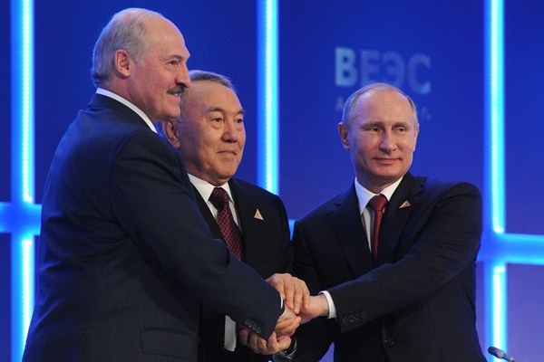 Russian President Vladimir Putin, Kazakh President Nursultan Nazarbayev and Belarusian President Alexander Lukashenko after signing an agreement to create the Eurasian Economic Union, Astana, Kazakhstan, May 29, 2014 (AP photo by Mikhail Klimentyev).