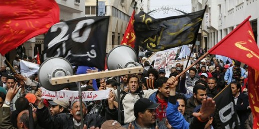 Anti-government protesters march with labor union activists, denouncing the government's failure to address unemployment and rising prices, Rabat, Morocco, March 31, 2013 (AP photo by Abdeljalil Bounhar).