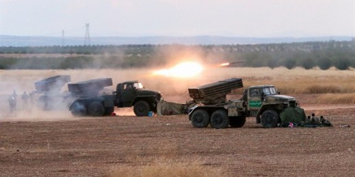 Syrian army rocket launchers fire near the village of Morek in Hama province, Oct. 7, 2015 (AP photo by Alexander Kots).