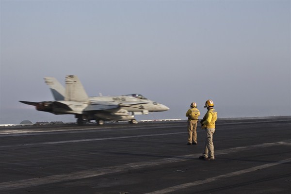 A U.S. Marine fighter jet aboard the USS Theodore Roosevelt aircraft carrier, Sept. 10, 2015 (AP photo by Marko Drobnjakovic).