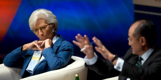 International Monetary Find Managing Director Christine Lagarde listens as World Bank President Jim Yong Kim addresses a forum in Lima, Peru, Oct. 7, 2015 (AP photo by Rodrigo Abd).
