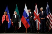 EU foreign policy chief Federica Mogherini, Iranian Foreign Minister Mohammad Javad Zarif, British Foreign Secretary Philip Hammond, and U.S. Secretary of State John Kerry, Vienna, Austria, July 14, 2015 (AP/Pool photo by Carlos Barria).