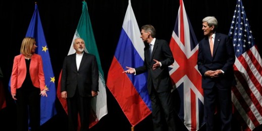 EU foreign policy chief Federica Mogherini, Iranian Foreign Minister Mohammad Javad Zarif, British Foreign Secretary Philip Hammond, and U.S. Secretary of State John Kerry, Vienna, Austria, July 14, 2015 (AP/Pool photo by Carlos Barria).