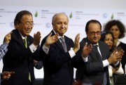 French President Francois Hollande, French Foreign Minister Laurent Fabius and United Nations Secretary-General Ban Ki-moon at the the United Nations conference on climate change, Le Bourget, France, Dec. 12, 2015 (AP photo by Francois Mori).