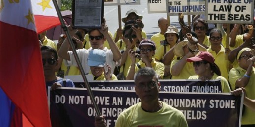 Protesters gather at the Chinese Consulate to protest island-building by China in the South China Sea, Manilla, Philippines, Aug. 31, 2015 (AP Photo by Bullit Marquez).