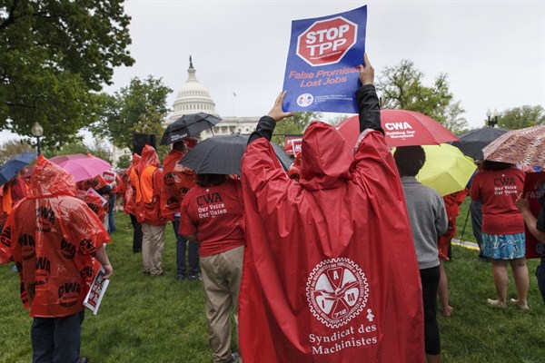 Demonstrators rally for fair trade at the Capitol, Washington, May 7, 2014 (AP photo by J. Scott Applewhite).