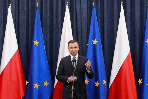 Polish President Andrzej Duda at the Presidential Palace after signing controversial legislation that regulates the constitutional court, Warsaw, Dec. 28, 2015 (AP photo by Czarek Sokolowski).