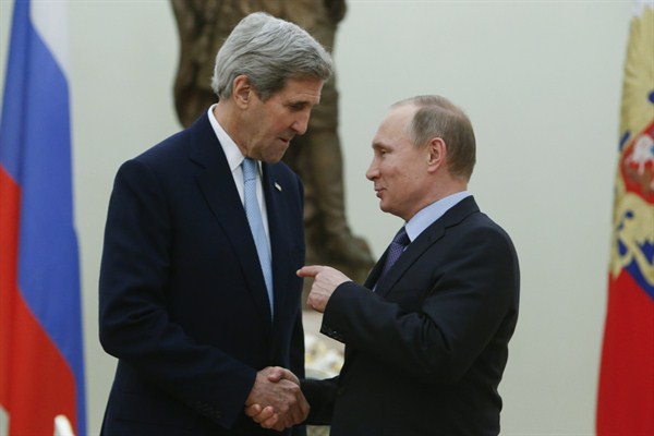 Russian President Vladimir Putin and U.S. Secretary of State John Kerry at the Kremlin, Moscow, Russia, Dec. 15, 2015 (AP photo by Sergei Karpukhin).