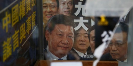 A book featuring a photo of Chinese President Xi Jinping and other Communist Party officials on the cover at the closed Causeway Bay Bookstore, Hong Kong, Feb. 5, 2016 (AP photo by Kin Cheung).