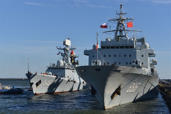 Chinese Navy Yiyang 548 frigate and Qiandaohu 886 supply vessel are moored in the navy port, Gdynia, Poland, Oct. 7, 2015 (AP photo by Andrzej J. Gojke).