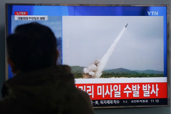 A man watches a TV news program showing footage of a North Korean missile launch, Seoul, South Korea, March 3, 2016 (AP photo by Ahn Young-joon).
