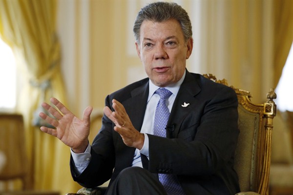 Colombian President Juan Manuel Santos answers a question during an interview at the Presidential Palace in Bogota, Colombia, Jan. 28, 2016 (AP photo by Fernando Vergara).