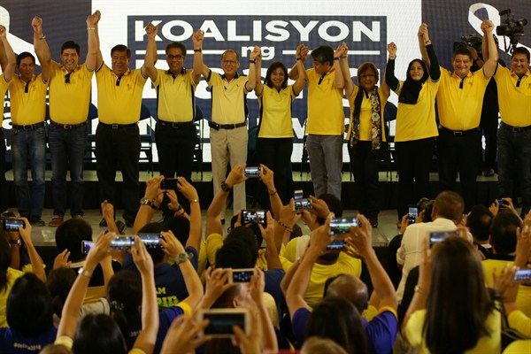Philippine President Benigno Aquino III, sixth from left, during the announcement of the senatorial slate for the 2016 elections, Quezon city, Philippines Oct. 12, 2015 (AP photo by Aaron Favila).
