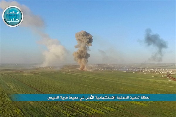 Smoke billowing as Nusra Front fighters attack the village of al-Ais, near Aleppo, in an image posted on the group's Twitter page, April 1, 2016 (Nusra Front via AP).
