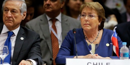 Chilean President Michelle Bachelet at the Mercosur Summit, with her Foreign Minister Heraldo Munoz, Luque, Paraguay, Dec. 21, 2015 (AP photo by Jorge Saenz).