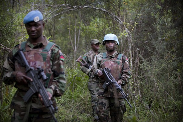 U.N. peacekeepers on patrol with Congolese soldiers near Tongo, eastern Democratic Republic of the Congo, March 19, 2014 (U.N. photo by Sylvain Liechti).