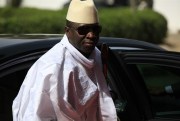 Gambian President Yahya Jammeh arriving at a security summit, Abuja, Nigeria, Feb. 27, 2014 (AP photo by Sunday Alamba).