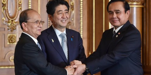 Japan's Prime Minister Shinzo Abe, center, shakes hands with Myanmar's] President Thein Sein, left, and Thailand's Prime Minister Prayuth Chan-ocha, July 4, 2015 (AP photo by Kazuhiro Nogi).