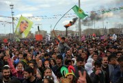 Celebrating the spring festival of Nowruz in the mainly Kurdish city of Diyarbakir, Turkey, March 21, 2016 (AP photo by Murat Bay).