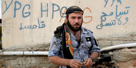 A Syrian Kurdish fighter from the People's Protection Units (YPG), Sinjar, Iraq, Jan. 29, 2015 (AP photo by Bram Janssen).