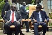 South Sudanese First Vice President Riek Machar, left, and President Salva Kiir after the first meeting of a new transitional government, Juba, South Sudan, April 29, 2016 (AP photo by Jason Patinkin).