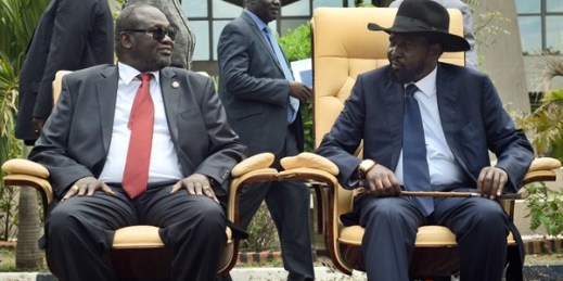 South Sudanese First Vice President Riek Machar, left, and President Salva Kiir after the first meeting of a new transitional government, Juba, South Sudan, April 29, 2016 (AP photo by Jason Patinkin).