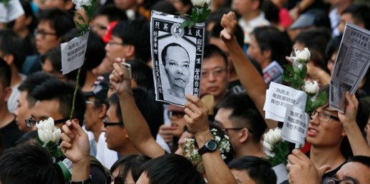 Thousands of protesters mourn Chinese labor activist Li Wangyang's death, Hong Kong, June 10, 2012 (AP photo by Vincent Yu).