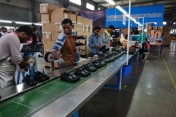 Employees of the Chinese-owned Huajian International Shoe City prepare a shipment of women’s loafers for export to the United States, Dukem, Ethiopia, April, 2016 (Photo by Jonathan Rosen).