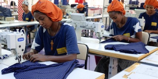 Women stitch pieces of a cotton dress at the Ayka-Addis textile and garment factory, Oromia, Ethiopia, April, 2016 (Photo by Jonathan Rosen).
