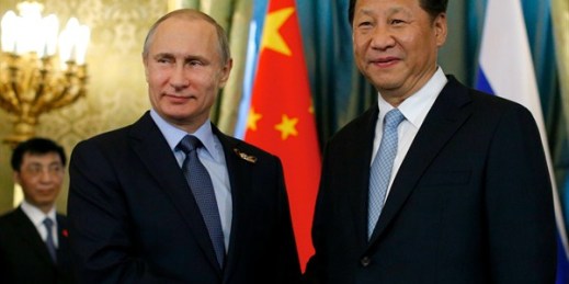 Russian President Vladimir Putin shakes hands with Chinese counterpart Xi Jinping during their meeting in Moscow's Kremlin, Russia, May 8, 2015 (AP photo by Alexander Zemlianichenko).