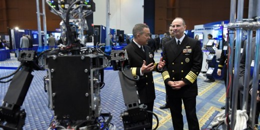 Navy Rear Adm. Mat Winter, left, and Navy Adm. Jonathan Greenert with the Navy-sponsored Shipboard Autonomous Firefighting Robot, Washington, Feb. 4, 2015 (Department of Defense photo).