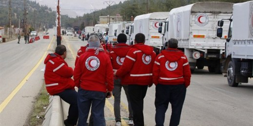 A convoy of aid vehicles loaded with food and other supplies travels to Madaya, Syria, Jan. 11, 2016 (AP photo).