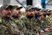 Fighters listen to Hezbollah leader Sheik Hassan Nasrallah as he speaks via a video link, Beirut, Lebanon, Nov. 11, 2015 (AP photo by Bilal Hussein).