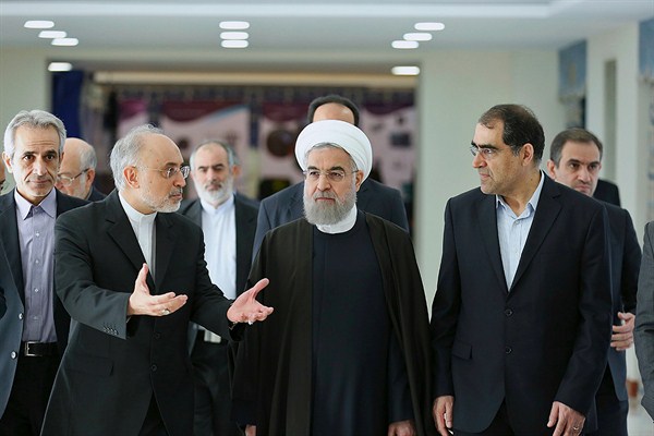 Iranian President Hassan Rouhani and the head of Iran's Atomic Energy Organization, Ali Akbar Salehi, at a ceremony marking the national day of nuclear technology, Tehran, April 7, 2016 (Iranian Presidency Office via AP).