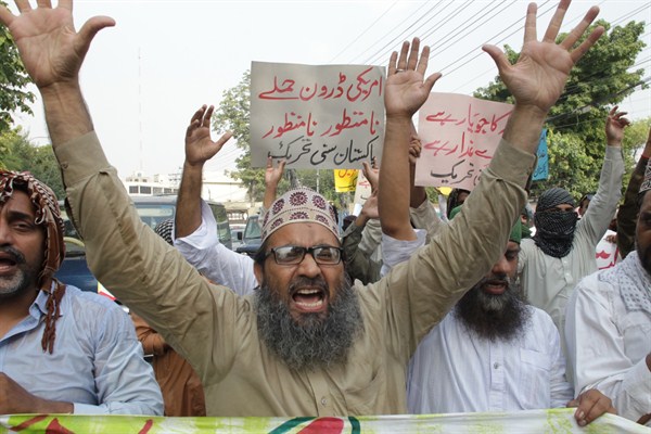 Pakistani protesters rally against recent U.S. drone attack in Pakistani territory, Lahore, Pakistan, June 10, 2016 (AP photo by K.M. Chaudary).