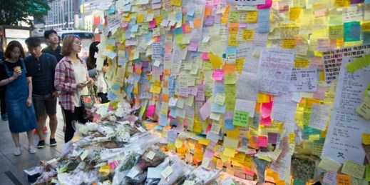 People leave notes at Gangnam Station to mourn the stabbing death of a 23-year-old woman by a male attacker, Seoul, South Korea, May 22, 2016 (AFLO photo by Lee Jae-Won via AP).