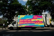 An advertisement urging U.K.-based start-ups to move to Berlin, London, July 5, 2016 (AP photo by Matt Dunham).