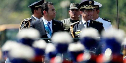 Guatemalan President Jimmy Morales and Defense Minister Williams Mansilla reviewing troops, Guatemala City, Jan. 15, 2016 (AP photo by Moises Castillo).