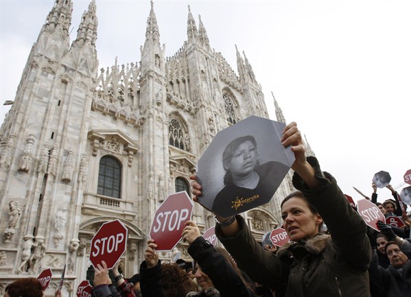 A group of women take part in a demonstration to protest violence against women, Milan, Italy, Nov. 23, 2009 (AP photo Antonio Calanni).