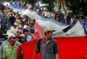 Farmers march to demand the government pardon their debts and protest a new sales tax, Asuncion, Paraguay, April 13, 2016 (AP photo Jorge Saenz).