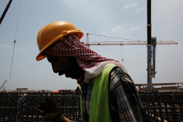 A worker at a construction site, Jeddah, Saudi Arabia, May 8, 2014 (AP photo by Hasan Jamali).