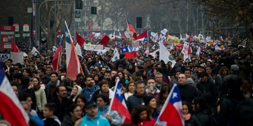 Thousands of workers march against the Pension Fund Administrators, Santiago, Chile, July 24, 2016 (AP photo by Esteban Felix).