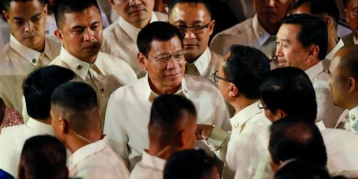Philippine President Rodrigo Duterte is greeted by lawmakers after delivering his first State of the Nation Address, northeast of Manila, July 25, 2016, in suburban Quezon city northeast of Manila (AP photo by Bullit Marquez).